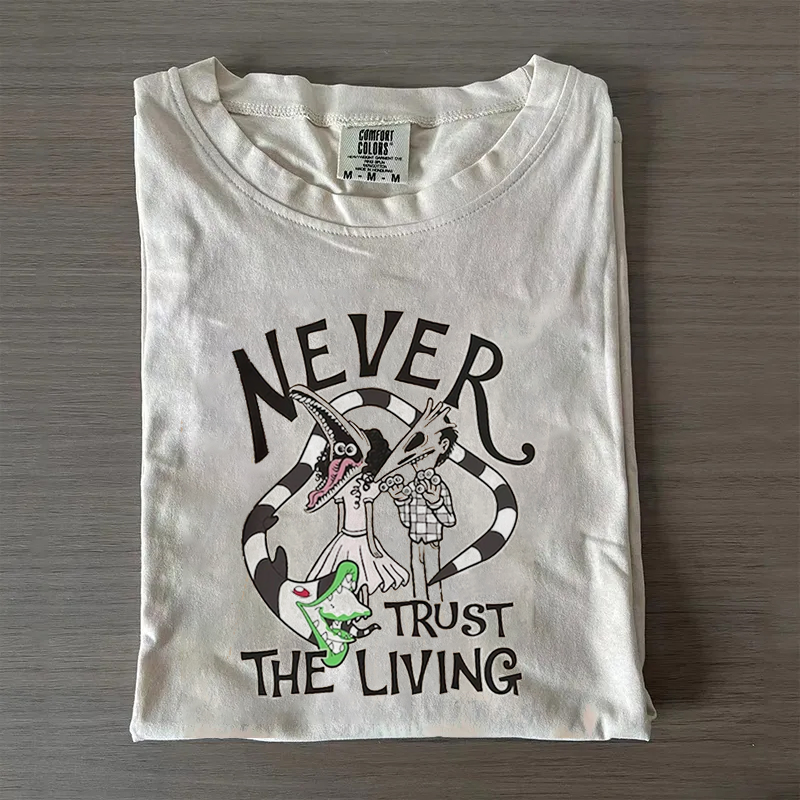 NEVER TRUST THE LIVING TEE